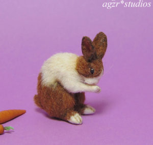 1:12 furred miniature dutch bunny washing his face