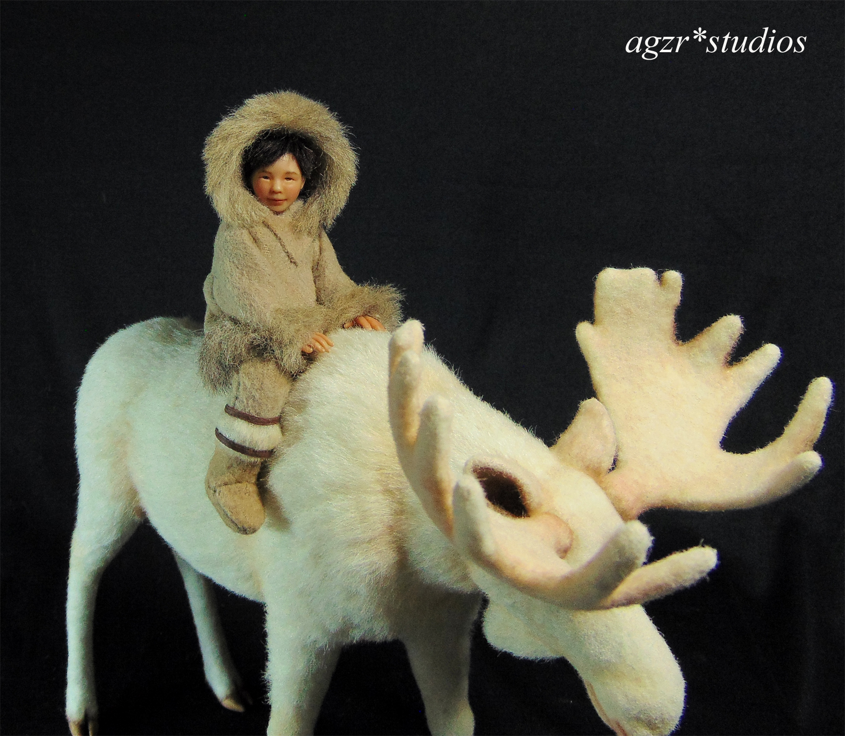 The little inuit with white moose in 1:12 scale sculpture art doll agzr studios